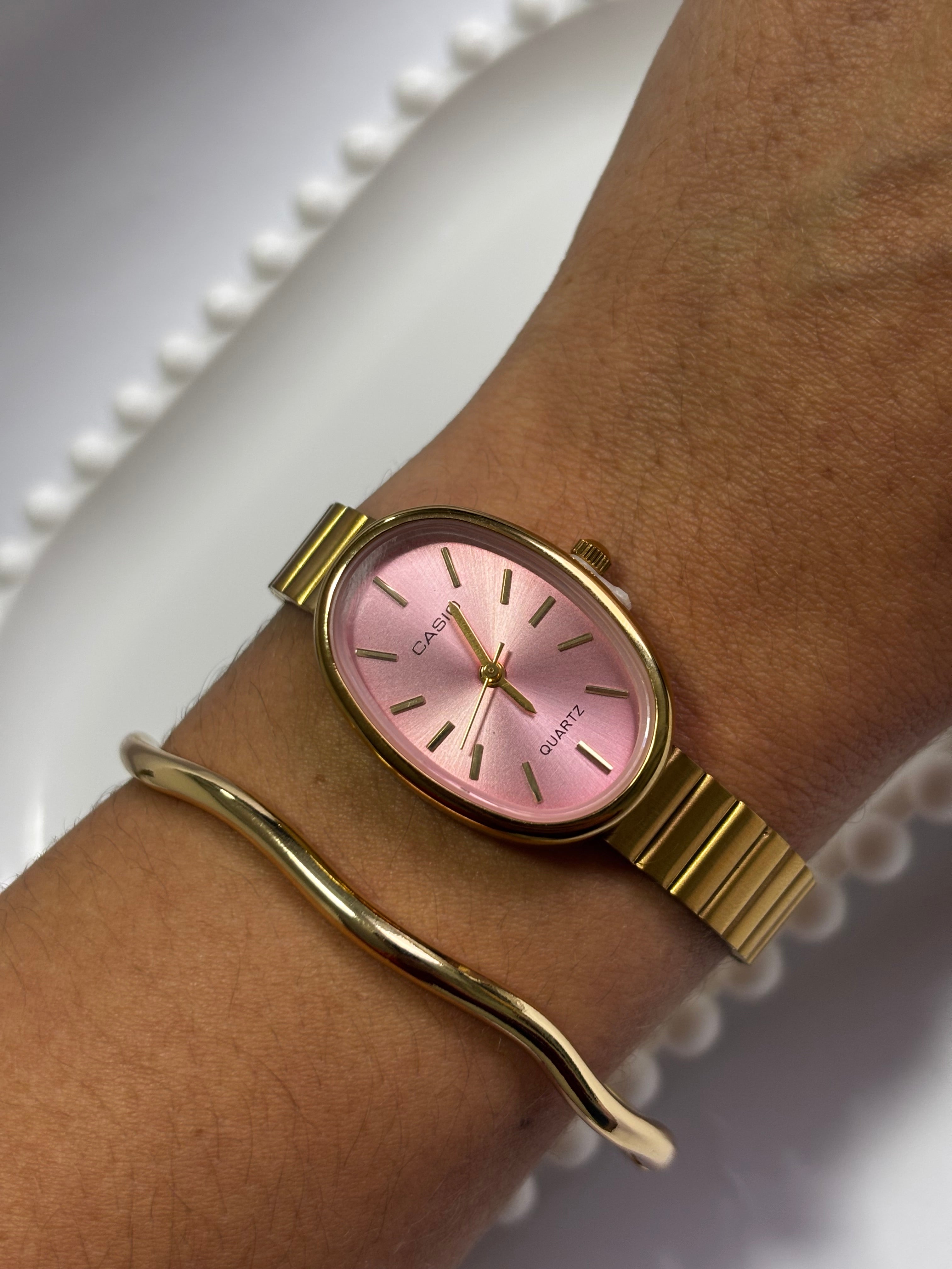 Relógio Cássio feminino oval fundo rosa