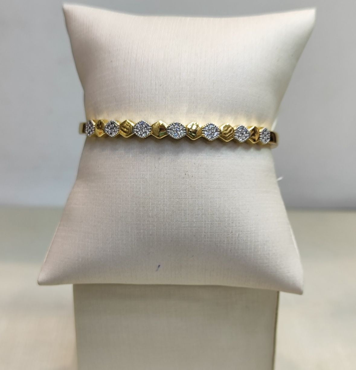 Bracelete prata e dourado