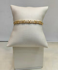 Bracelete dourado x cravejado